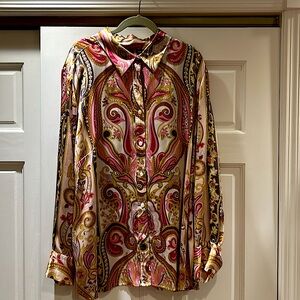 100 percent silk. Paisley blouse.  Button front and cuffs.